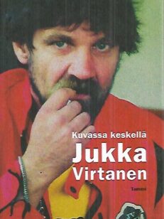 Kuvassa keskellä Jukka Virtanen