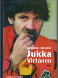 Kuvassa keskellä Jukka Virtanen