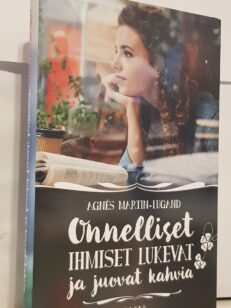 Onnelliset ihmiset lukevat ja juovat kahvia